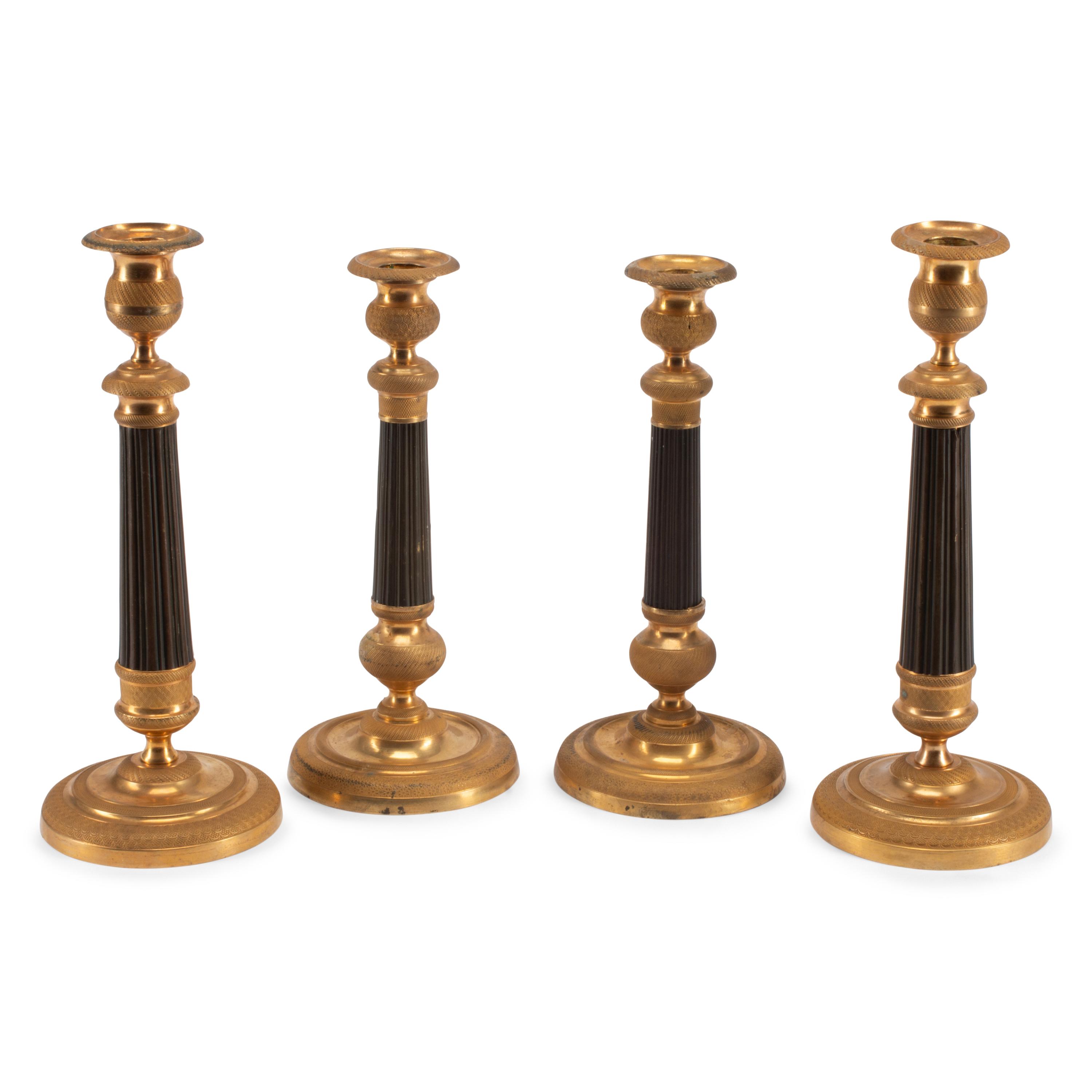 Two Pairs of Empire Style Brass Candlesticks