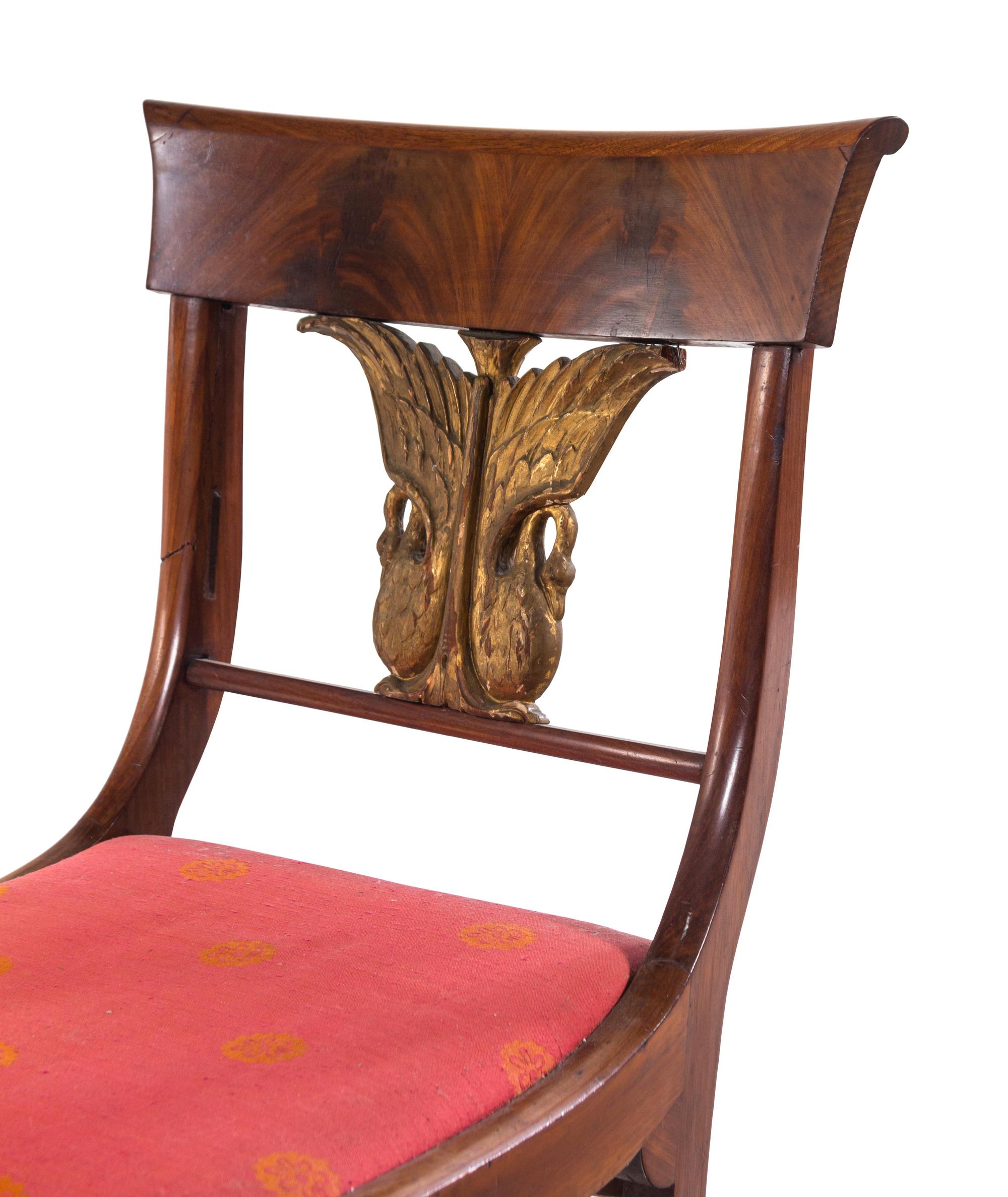 A Set of Four Italian Parcel Gilt Walnut Side Chairs