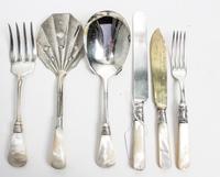 An Assembled Silver-Plate and Mother-of-Pearl Handled Dessert Service, , comprising two sets of six dessert knives, six fruit knives, s