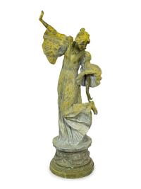 An Art Nouveau Patinated Bronze Figure of Woman is Flowing Dress — 19TH/20TH CENTURY