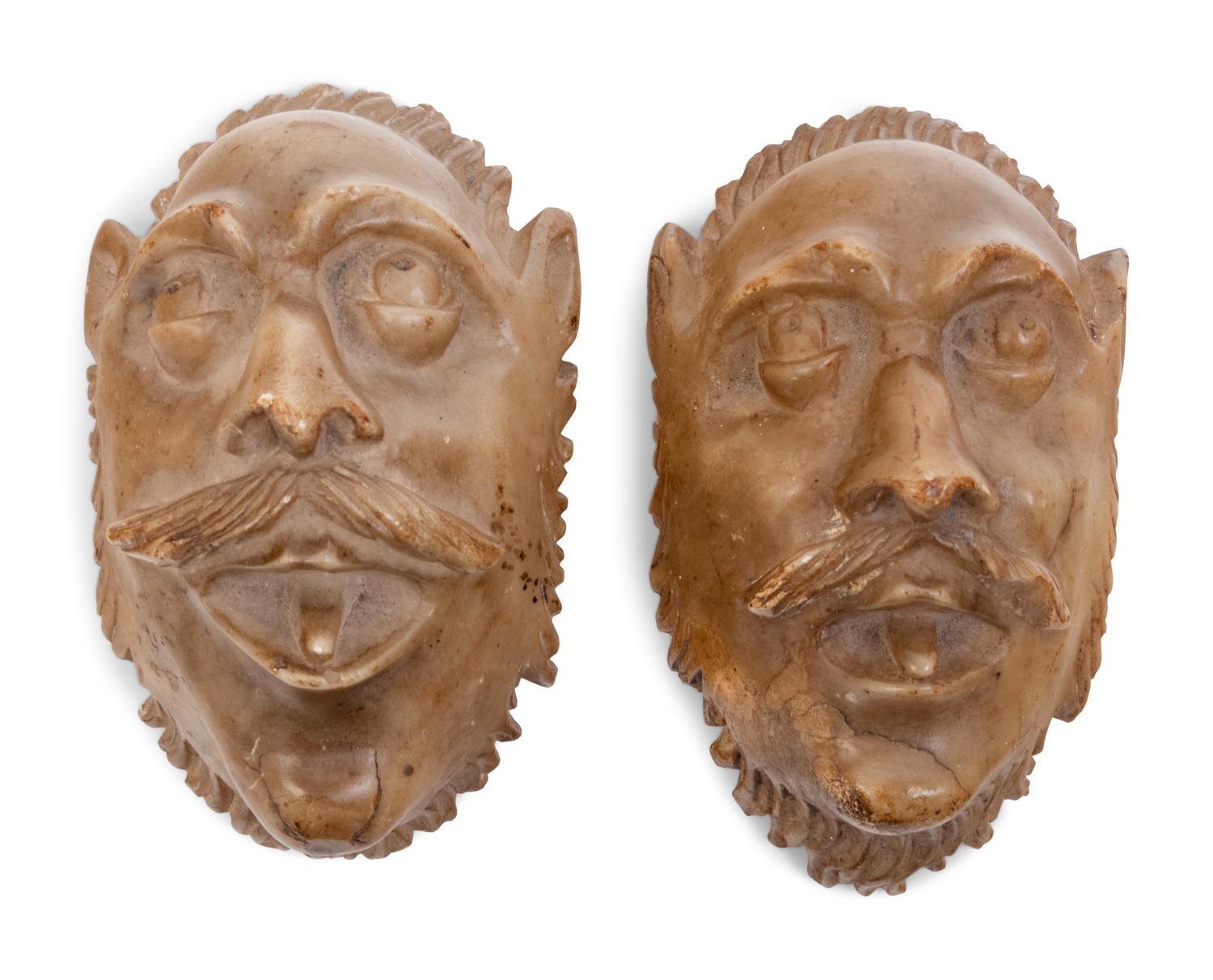 Two Continental Carved Alabaster Masks