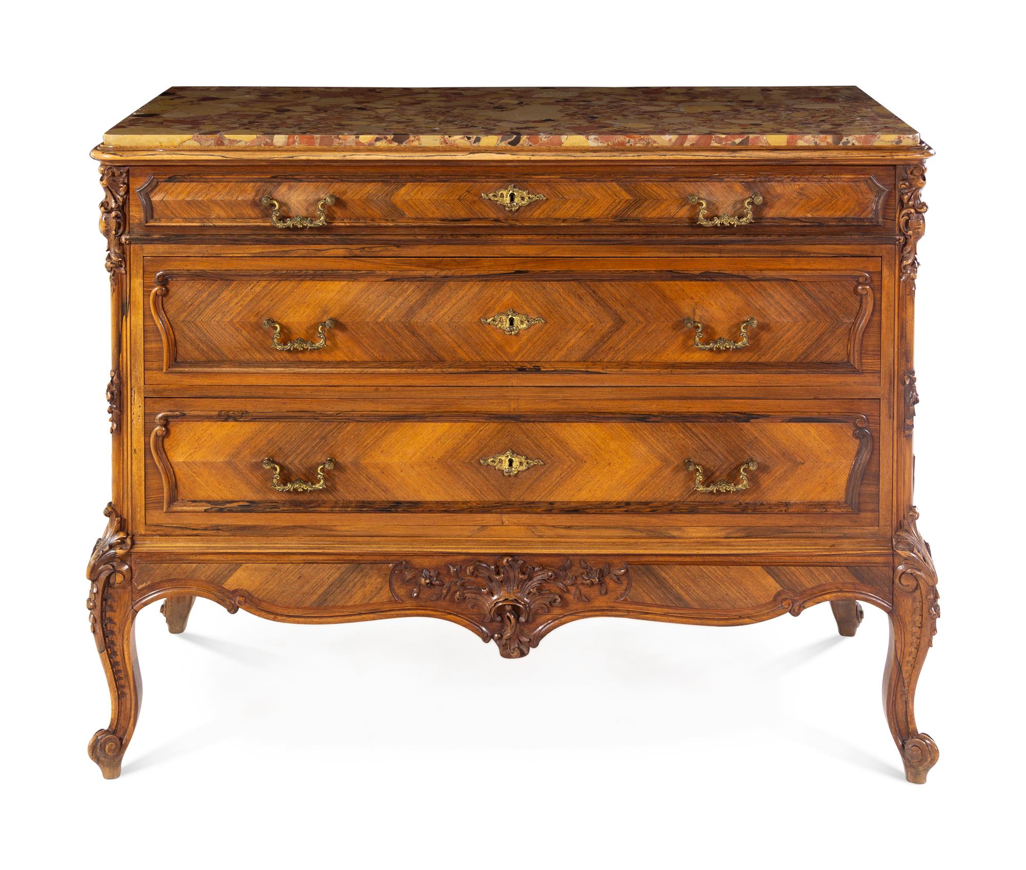 A Louis XV Style Walnut Commode
