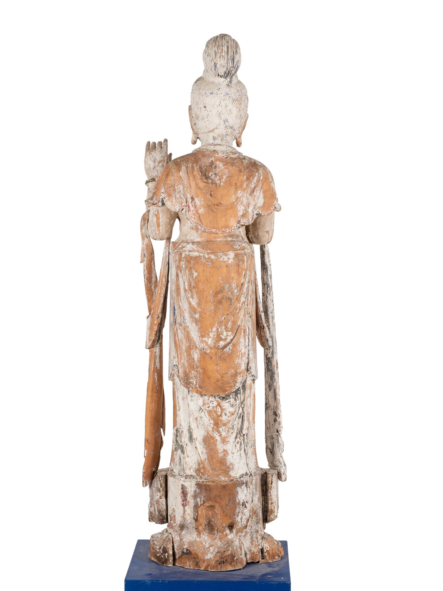 A Chinese Carved Wood Figure of Standing Guanyin
