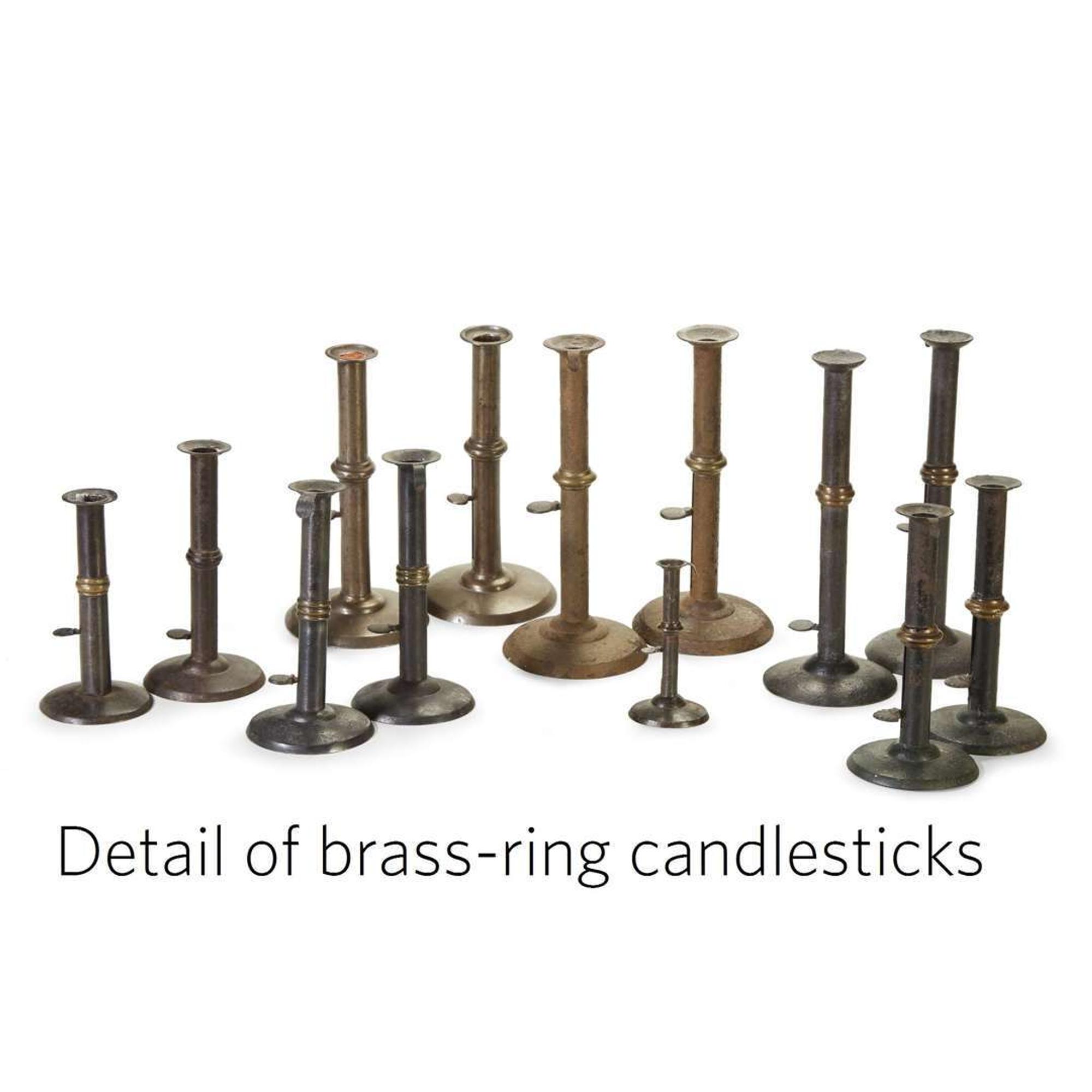 Large collection of thirty-seven iron hogscraper candlesticks 18th/19th century