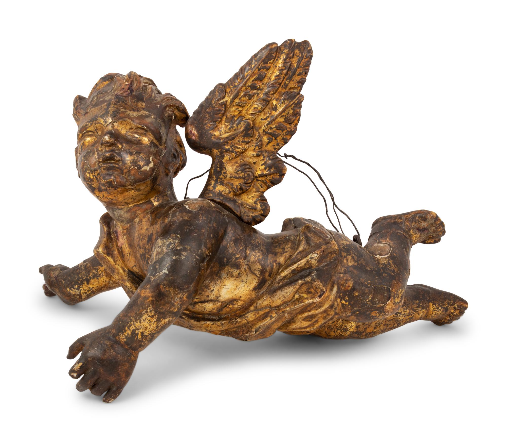 An Italian Giltwood Cherub Figure