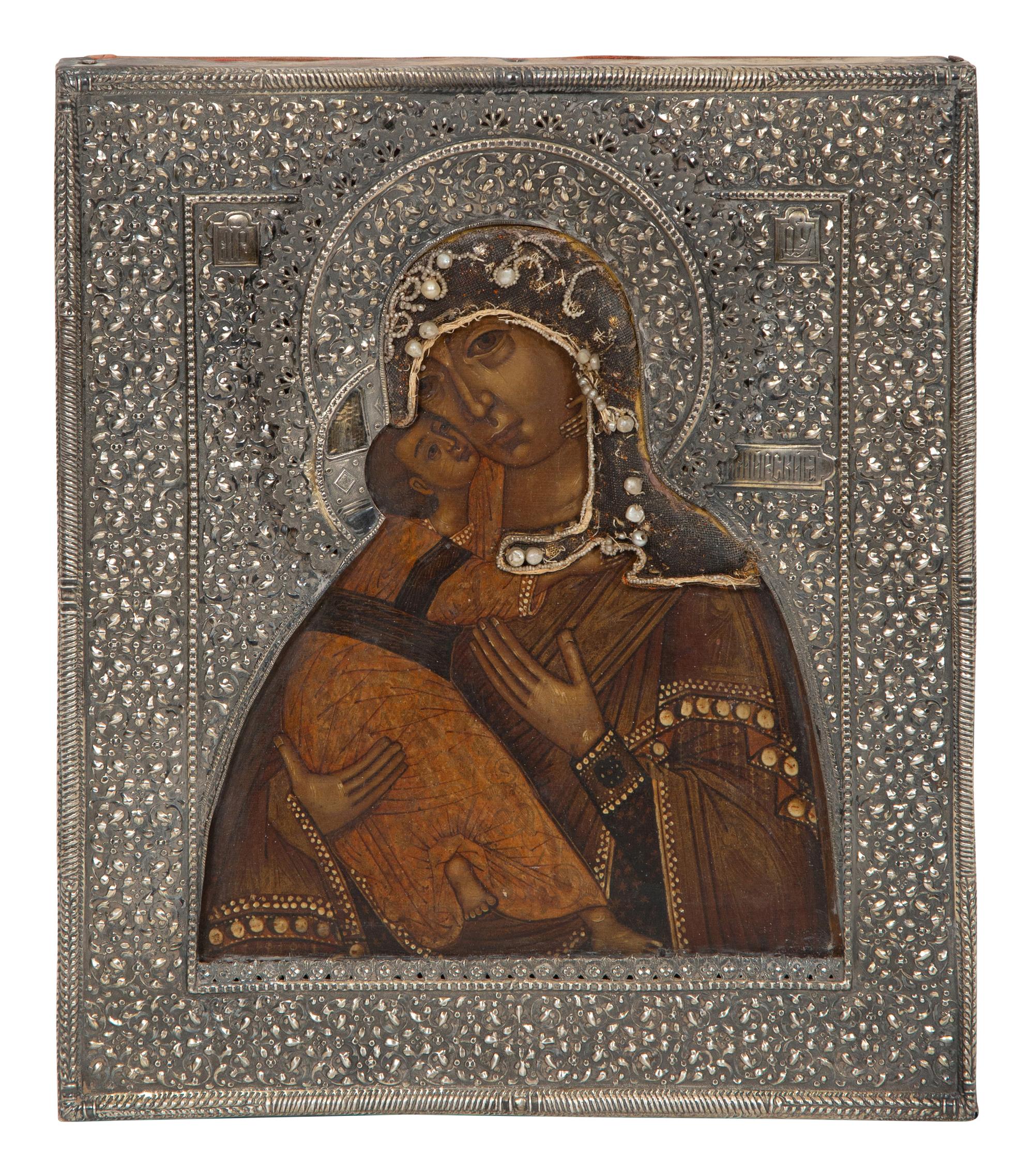 A Russian Silver and Pearl Inset Oklad Icon