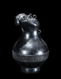 A Chinese Archaistic Bronze Animal-Form Wine Vessel