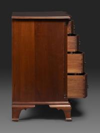 A Chippendale Carved Cherrywood Reverse-Serpentine Chest of Drawers