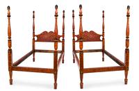 A Pair of Ebonized and Faux Burr Elm Painted Single Four-Poster Beds Height 64 x width 41 x depth 77 inches. — 20TH CENTURY