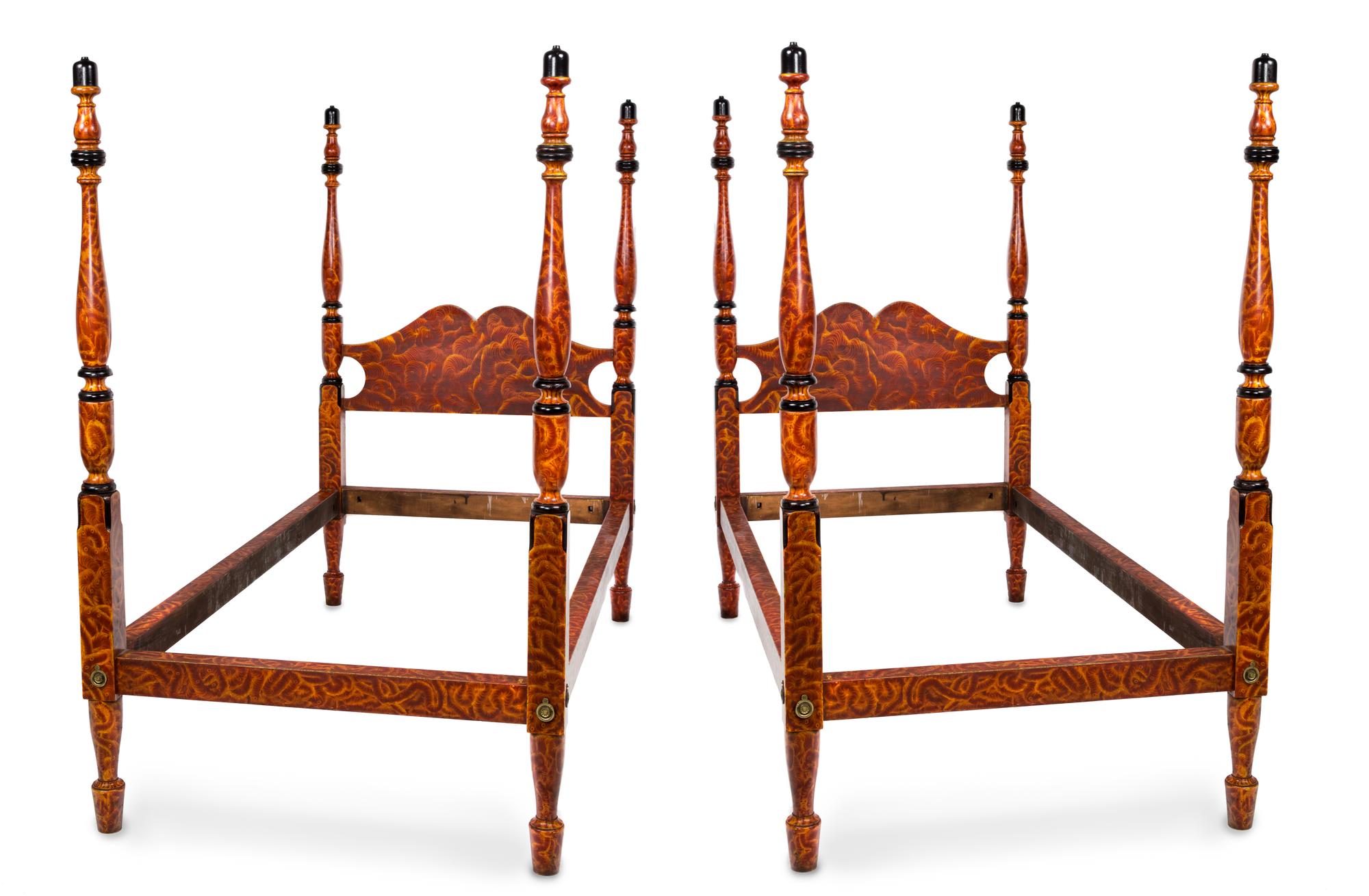 A Pair of Ebonized and Faux Burr Elm Painted Single Four-Poster Beds Height 64 x width 41 x depth 77 inches. — 20TH CENTURY