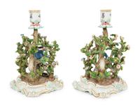 A Pair of Meissen Porcelain Figural Candlesticks with Floral Arbors