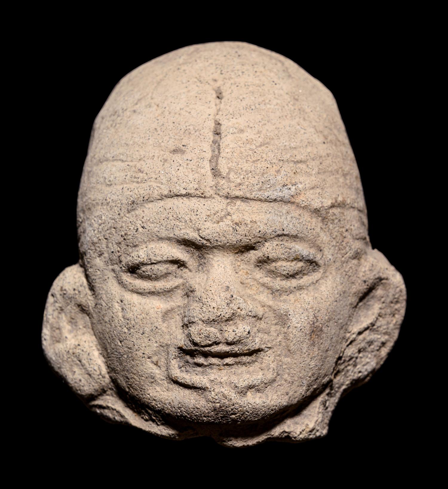 A Group of Ten Tumaco Terracotta Heads