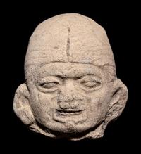 A Group of Ten Tumaco Terracotta Heads