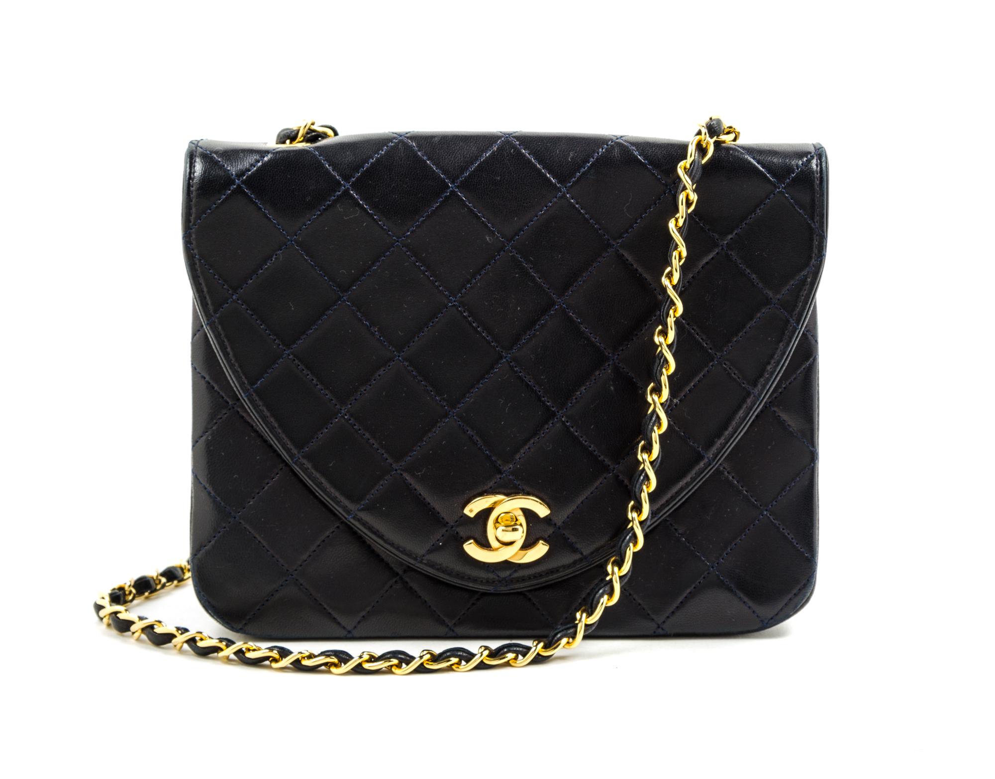 A Chanel Navy Classic Leather Handbag, 8.5" x 6.5" x 3".