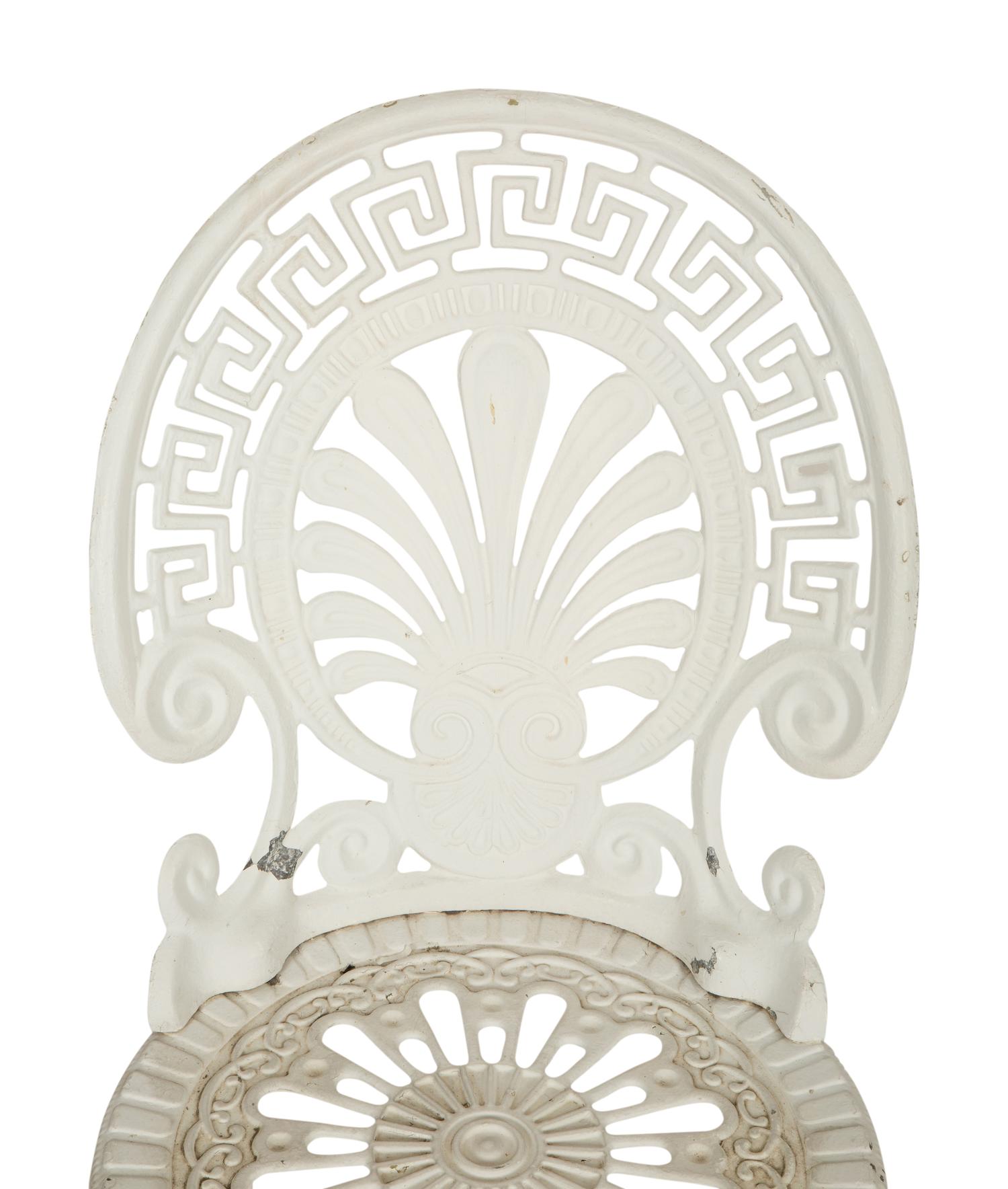 A Pair of White Painted Cast Metal Garden Chairs