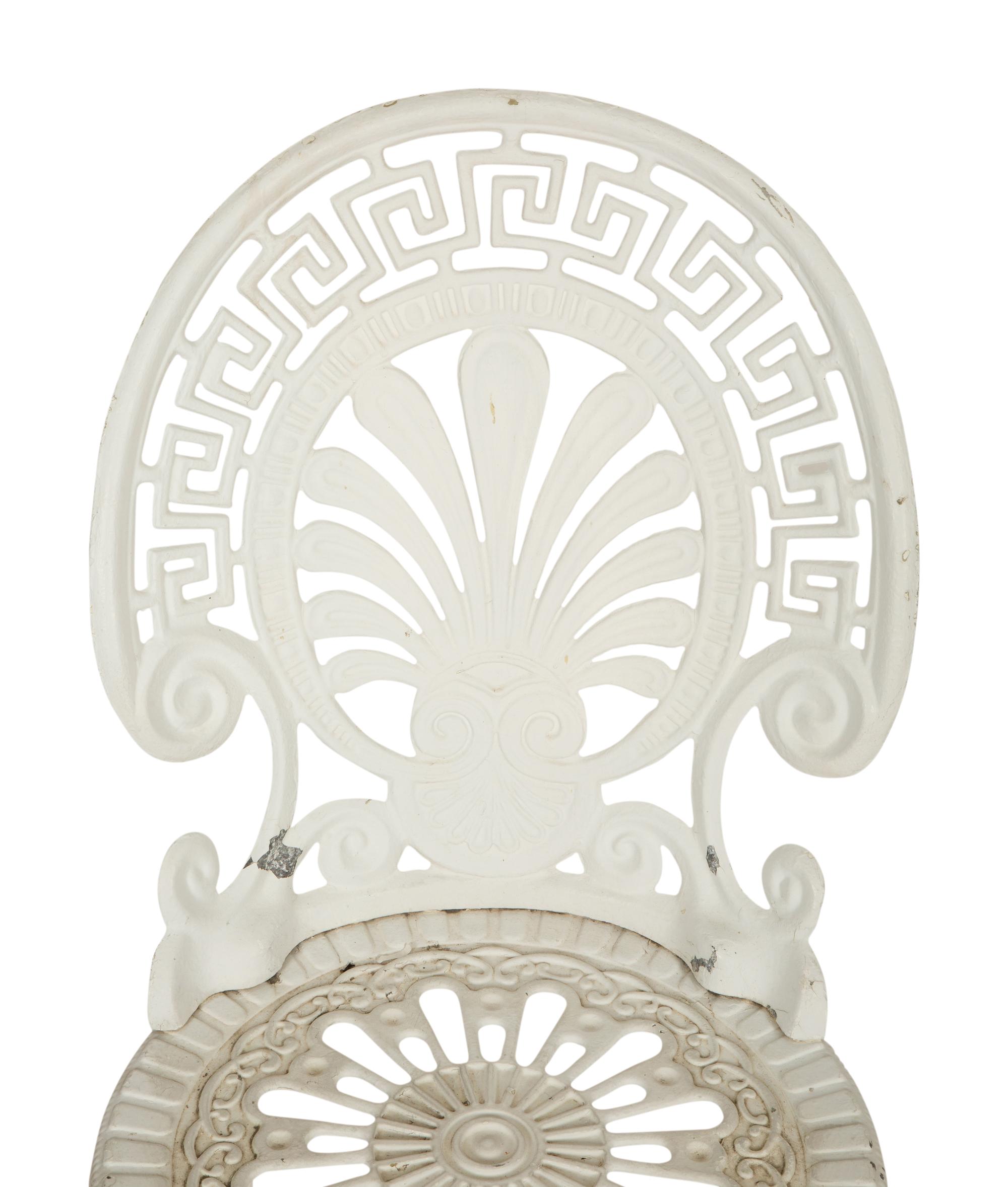 A Pair of White Painted Cast Metal Garden Chairs