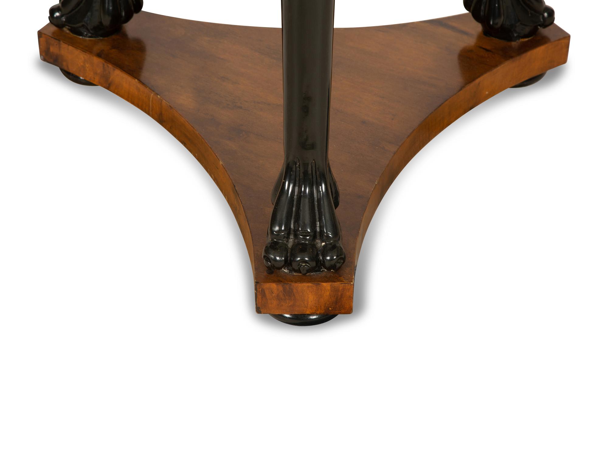 A Pair of Empire Style Walnut, Black Lacquer and Parcel Gilt Side Tables