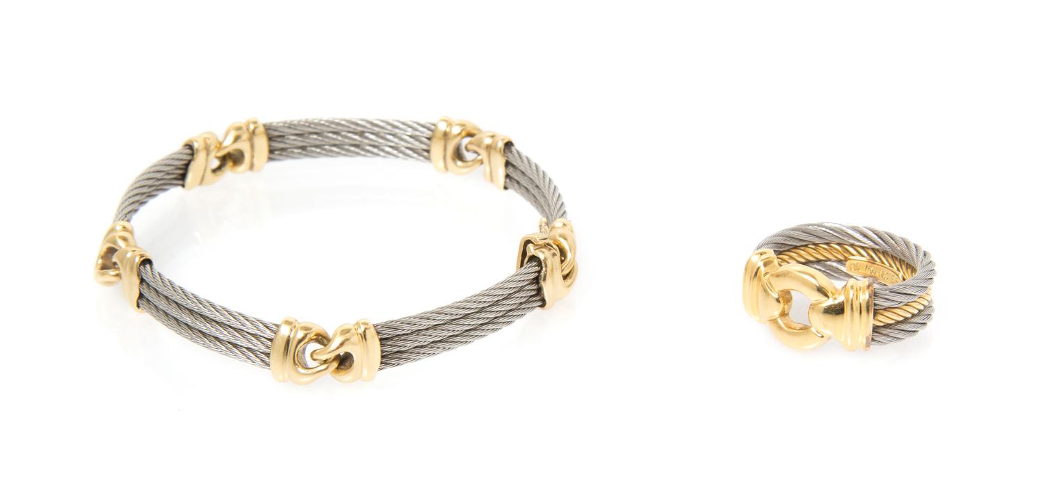 A Collection of 18 Karat Yellow Gold and Stainless Steel Jewelry, 19.20 dwts.