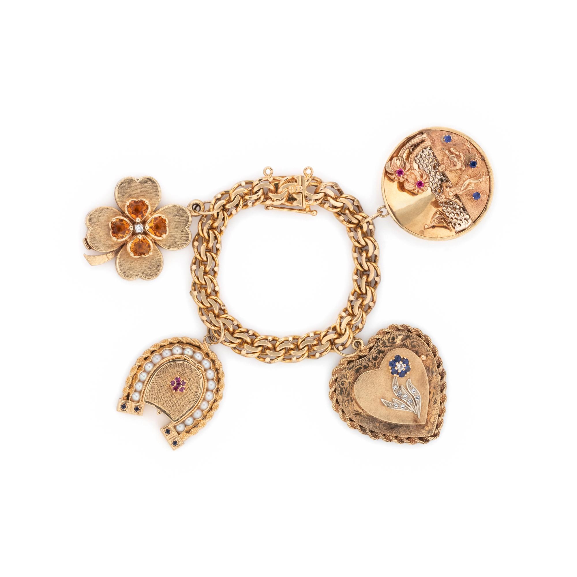 YELLOW GOLD AND GEMSTONE CHARM BRACELET