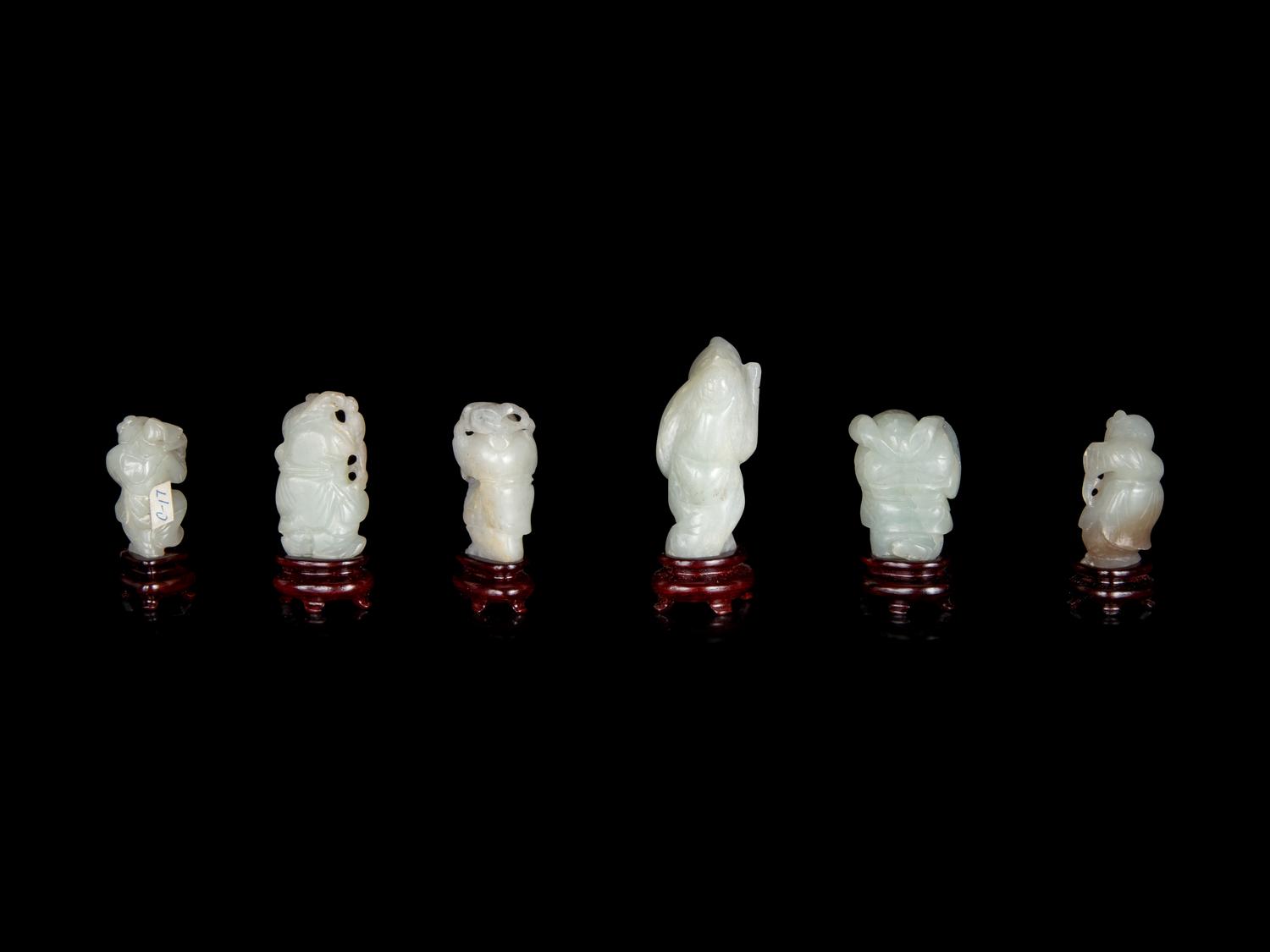 Six Chinese Carved Celadon Jade Figures of Boys
