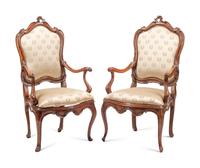 A Pair of Venetian Carved Walnut Armchairs