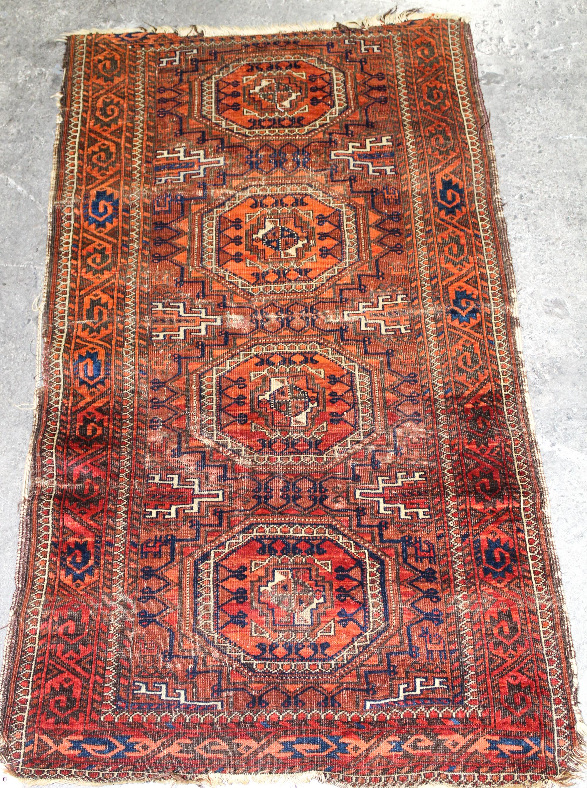 A Caucasian Wool Rug 4 feet 5 inches x 2 feet 7 inches. — EARLY 20TH CENTURY