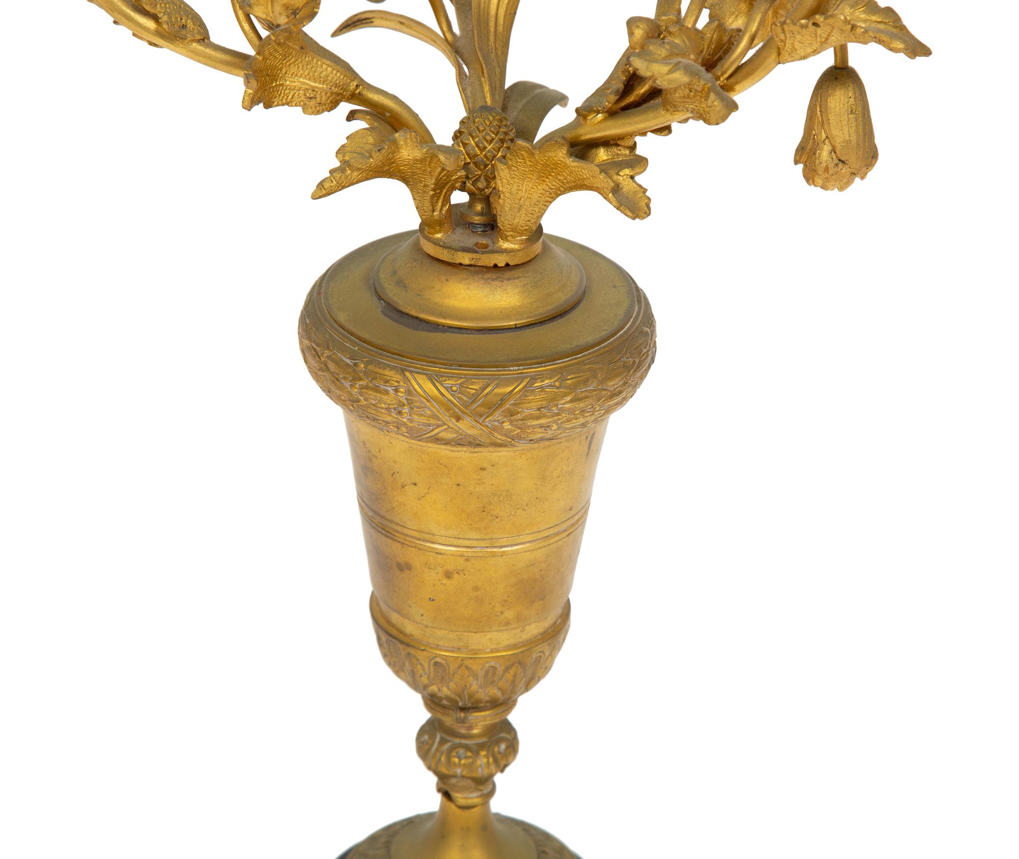 A Near Pair of French Gilt Bronze Floral Three-Light Candelabra