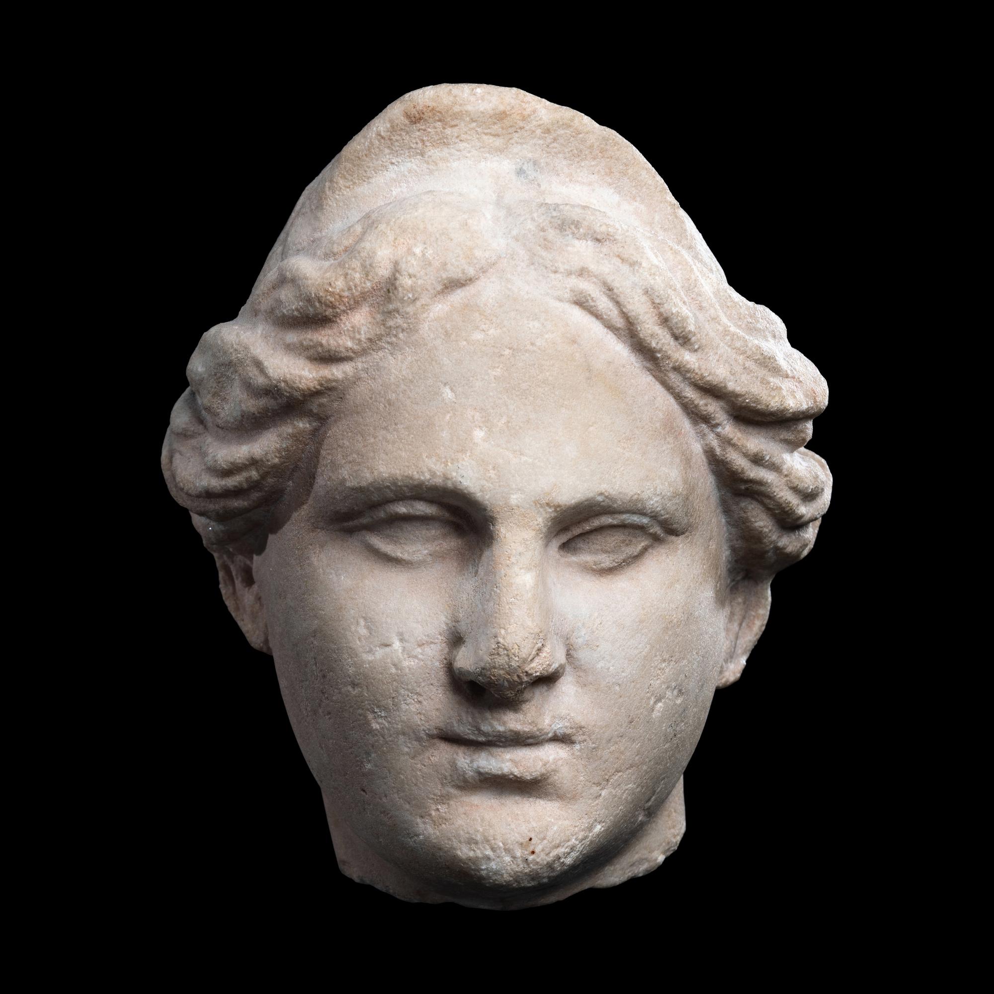 A Roman Marble Head of a Goddess