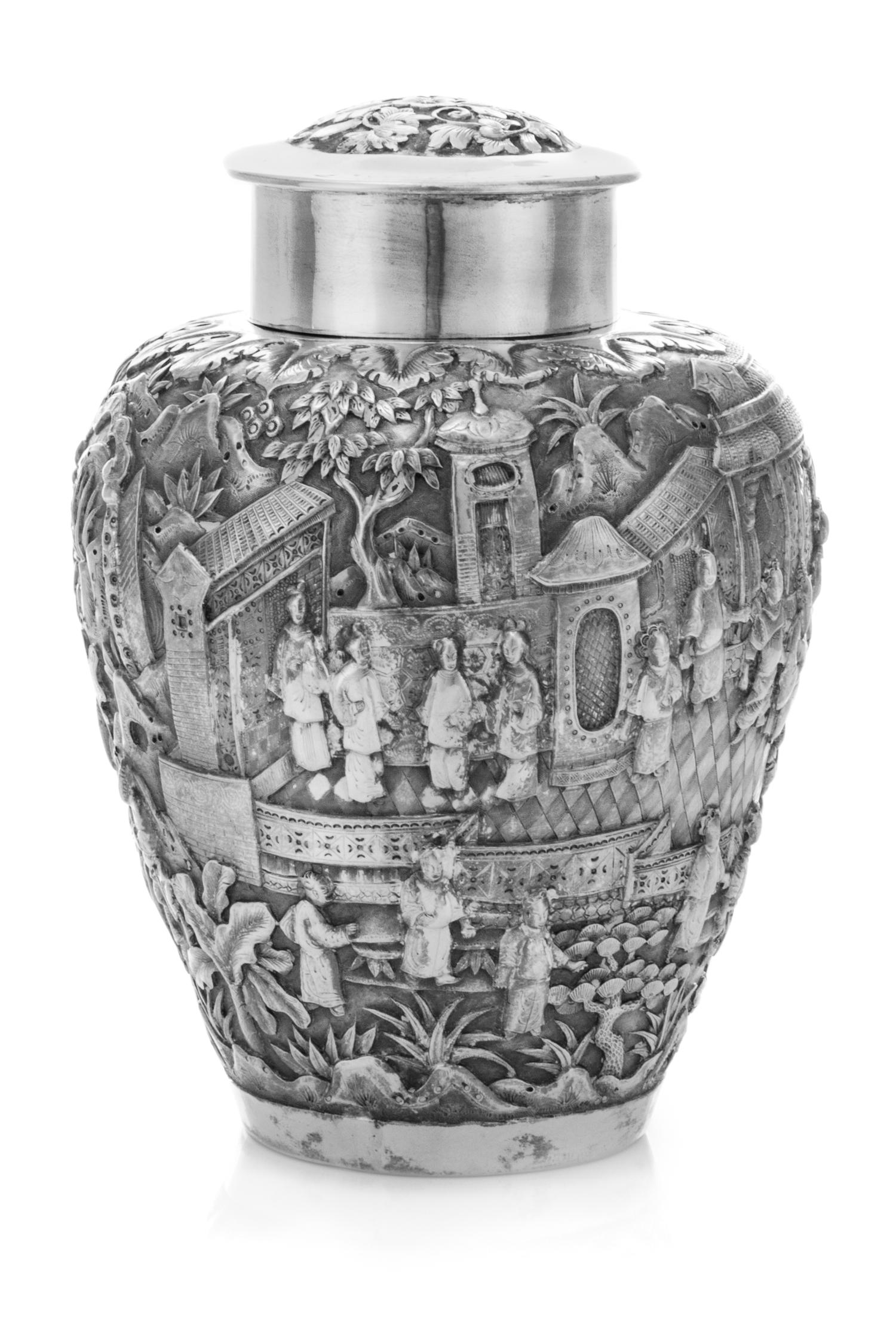 A Chinese Export Silver Tea Caddy, Hung Chong, Canton, Late 19th/Early 20th Century, of urn form, worked to show figures in a garden se