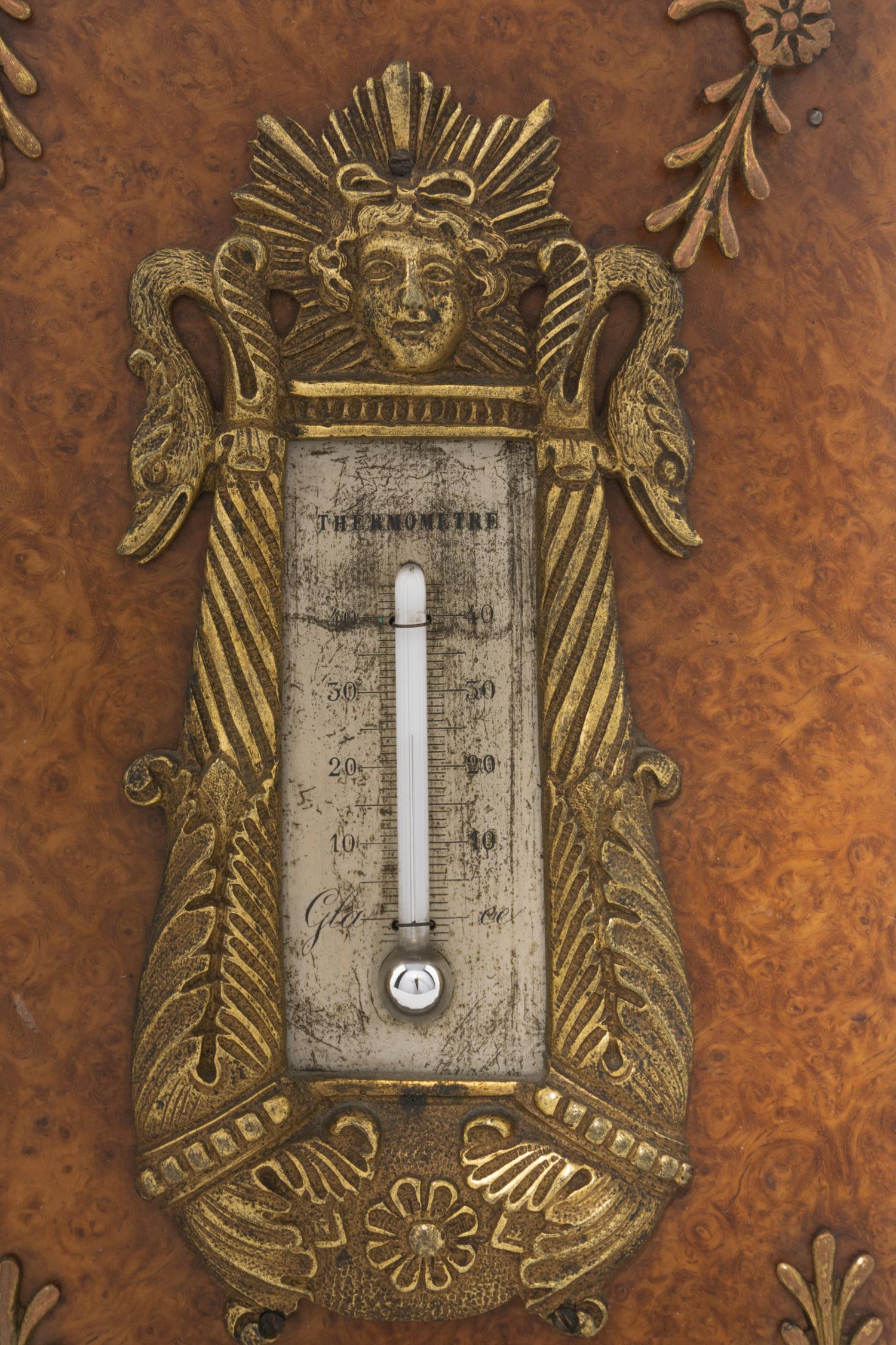 An Empire Gilt Bronze and Burlwood Desk Thermometer and Barometer Set