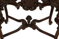 An Italian Rococo Style Carved Black Walnut Marble Top Side Table