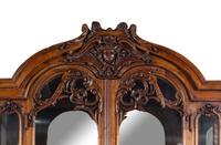 A Louis XV Style Carved Walnut Buffet à Deux Corps