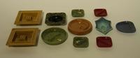 A Collection of Twenty-Three Haeger Pottery Ash Receivers Width of widest 7 7/8 inches.