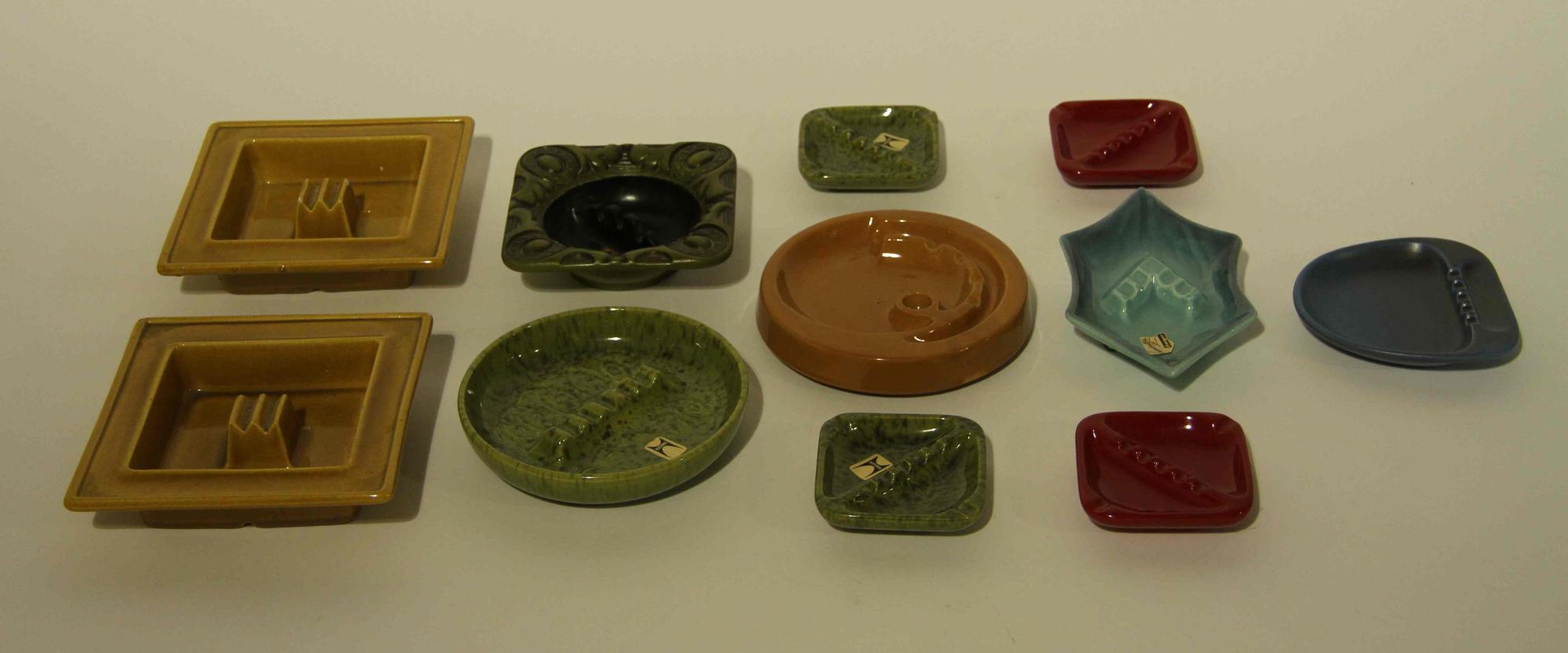 A Collection of Twenty-Three Haeger Pottery Ash Receivers Width of widest 7 7/8 inches.