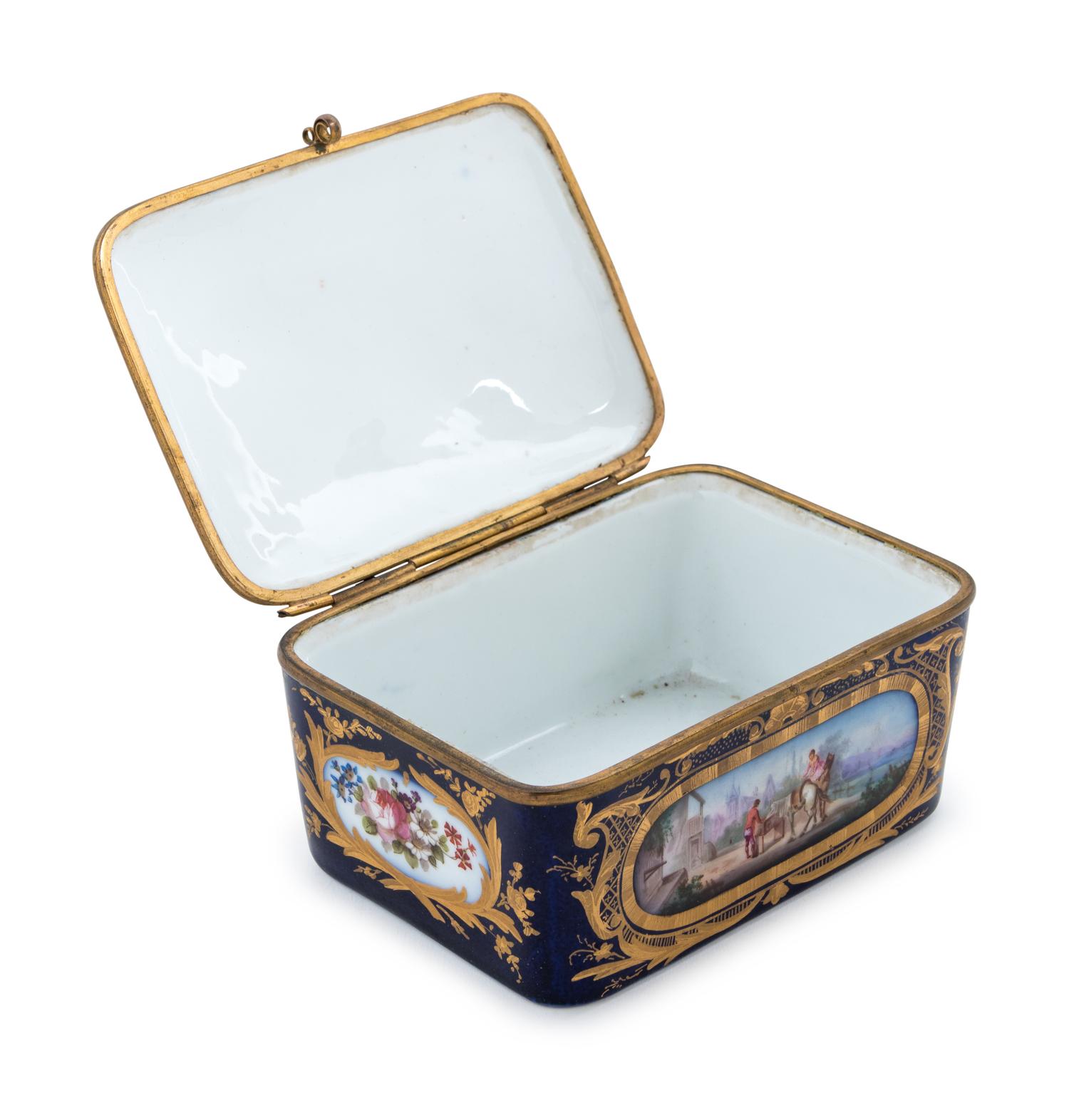 A Sèvres Style Gilt Metal Mounted Painted and Parcel Gilt Porcelain Table Casket