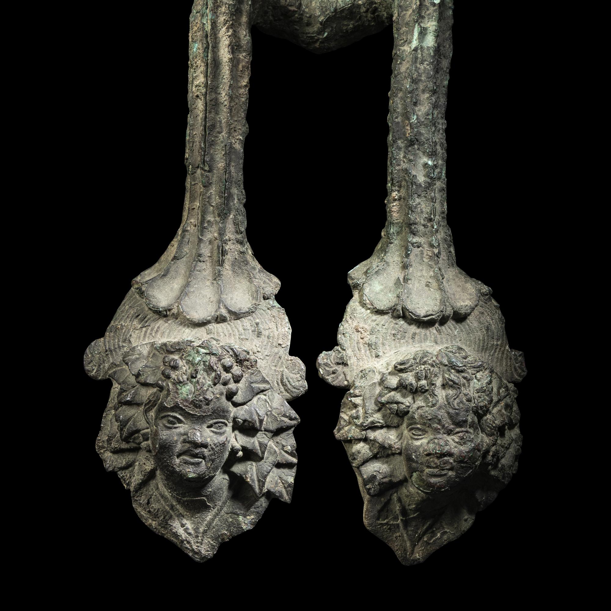A Roman Bronze Hydria Handle