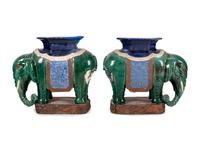 A Pair of Chinese Polychrome Glazed Porcelain Elephant Stands