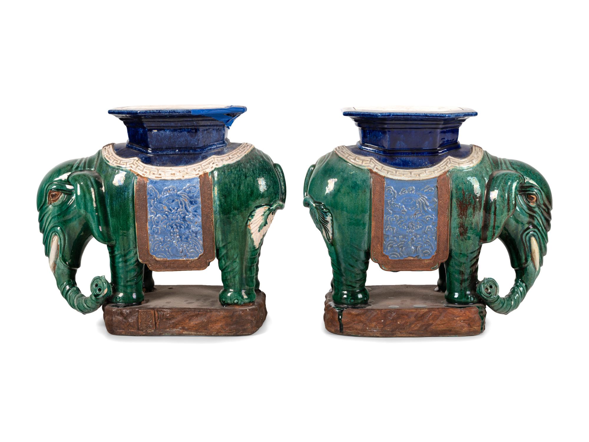 A Pair of Chinese Polychrome Glazed Porcelain Elephant Stands