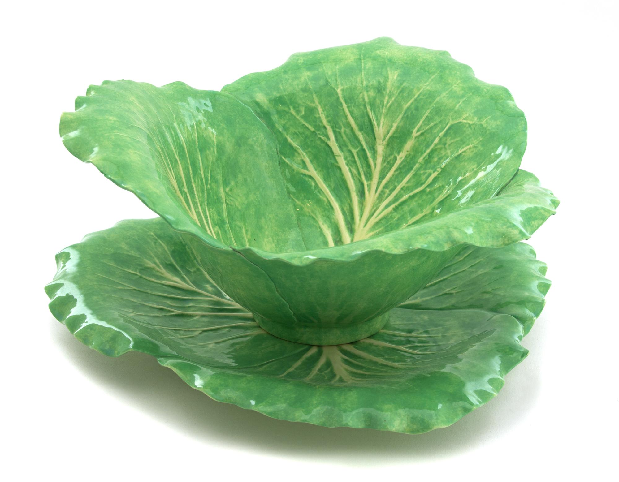 A Dodie Thayer Three Leaf Lettuceware Bowl and Charger Height of bowl 6 x diameter 11 1/2 inches. — 20TH CENTURY