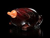 Two Carved Amber Snuff Bottles