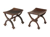 A Pair of Spanish Leather Stools