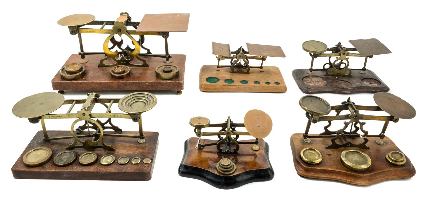 A Group of Six Brass Postage Scales Width of largest 13 inches. — WILLIAM BROWN & CO., LONDON AND OTHERS