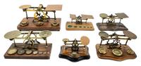 A Group of Six Brass Postage Scales Width of largest 13 inches. — WILLIAM BROWN & CO., LONDON AND OTHERS