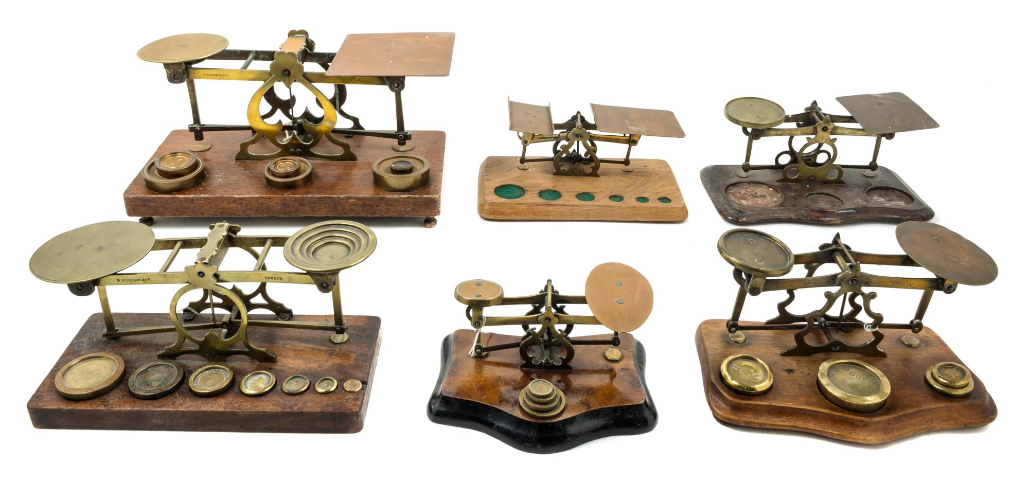 A Group of Six Brass Postage Scales Width of largest 13 inches. — WILLIAM BROWN & CO., LONDON AND OTHERS