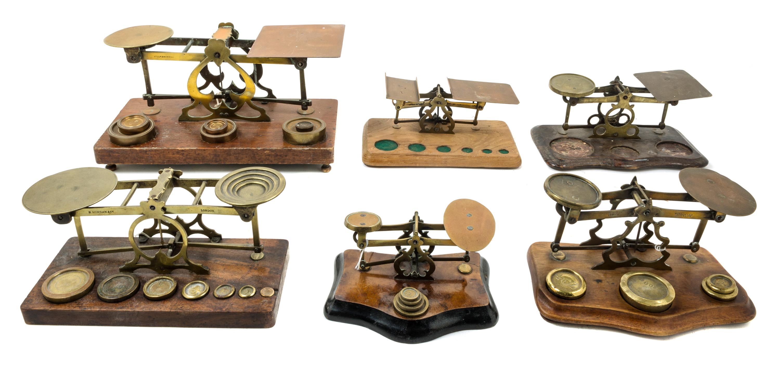 A Group of Six Brass Postage Scales Width of largest 13 inches. — WILLIAM BROWN & CO., LONDON AND OTHERS
