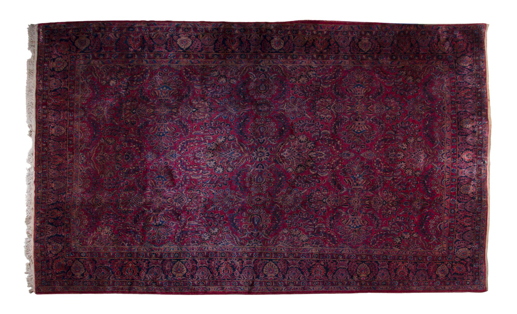 A Sarouk Wool Rug, 14 feet 1 inch x 10 feet.