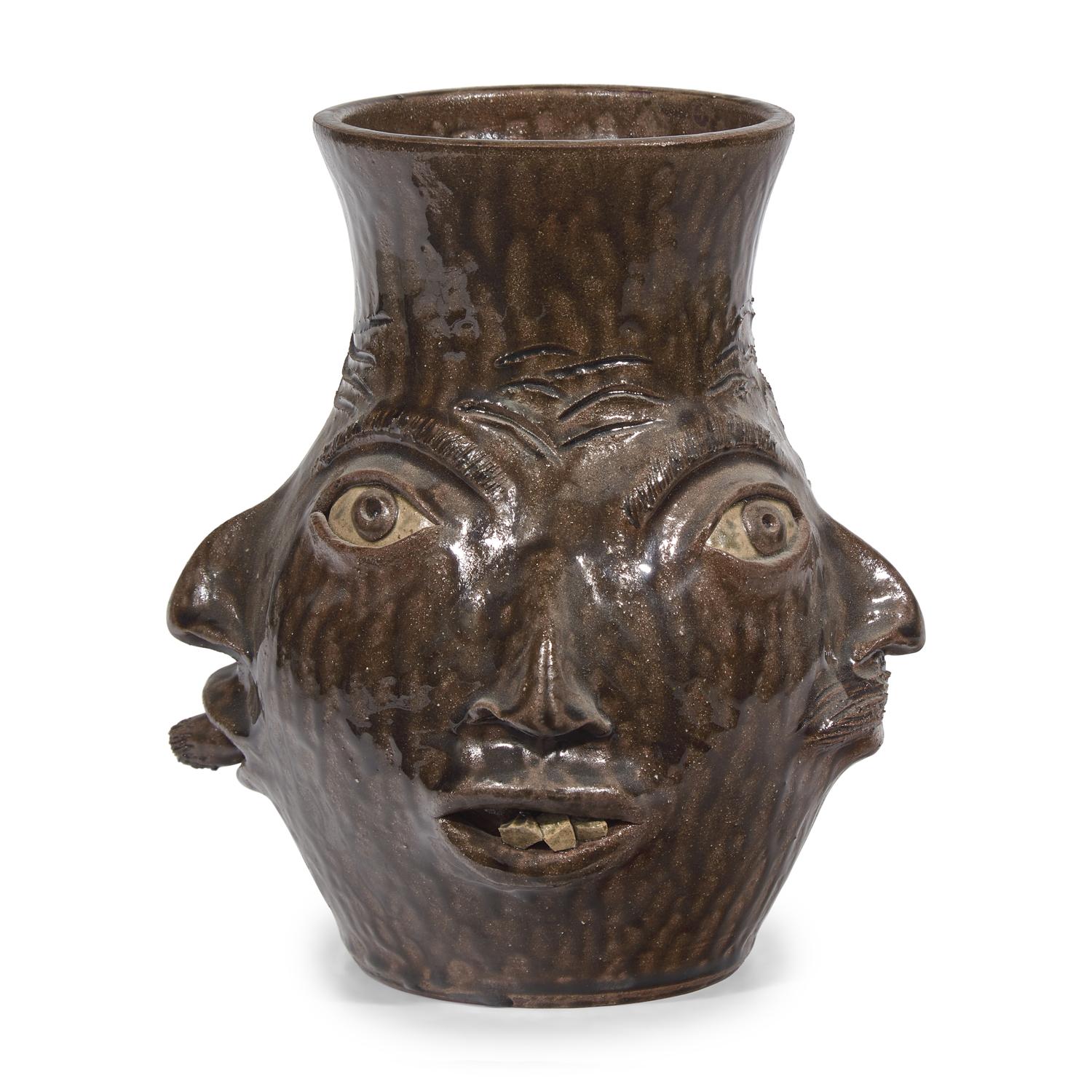 Charlie West, A Glazed Stoneware Work: Four-Sided Face Jug