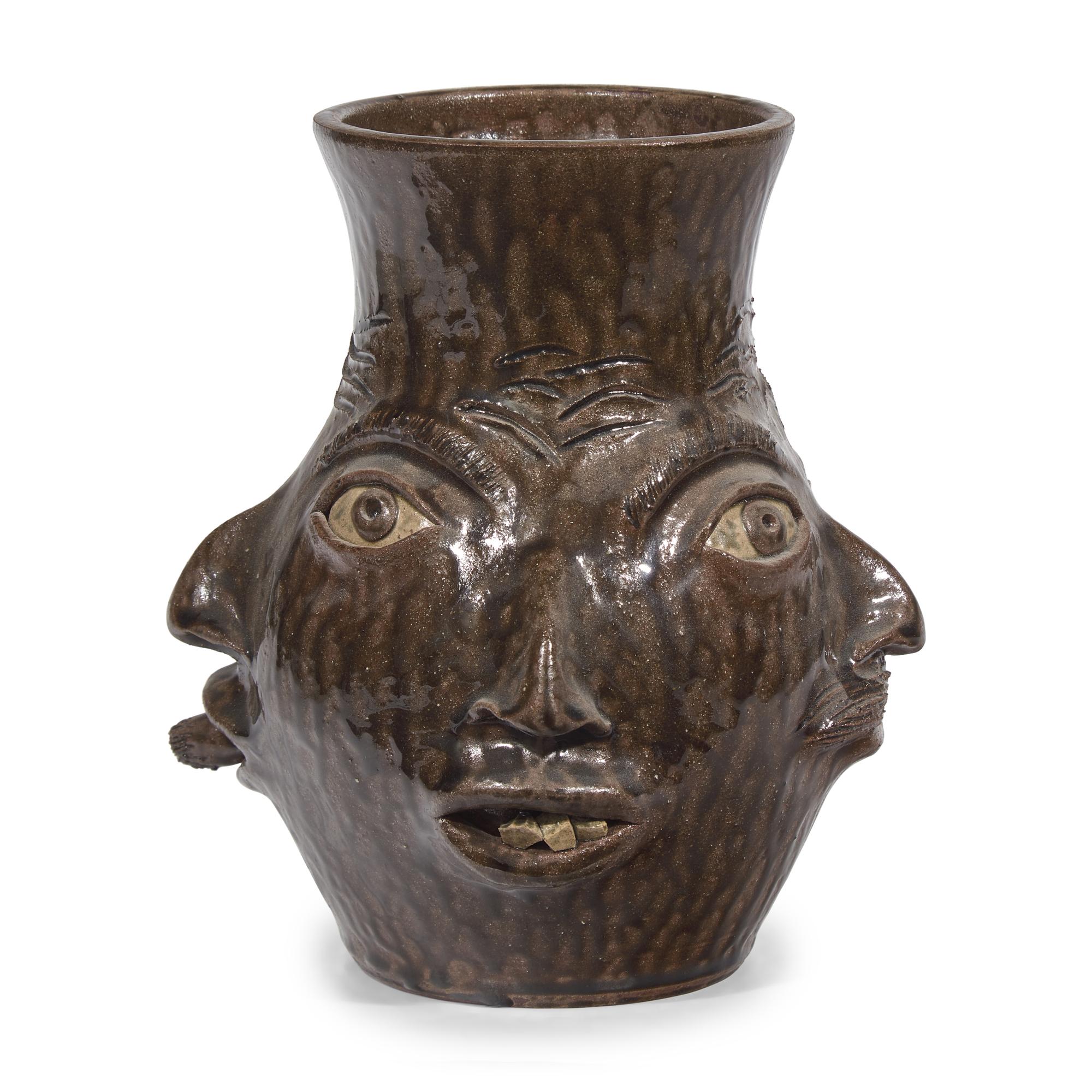 Charlie West, A Glazed Stoneware Work: Four-Sided Face Jug