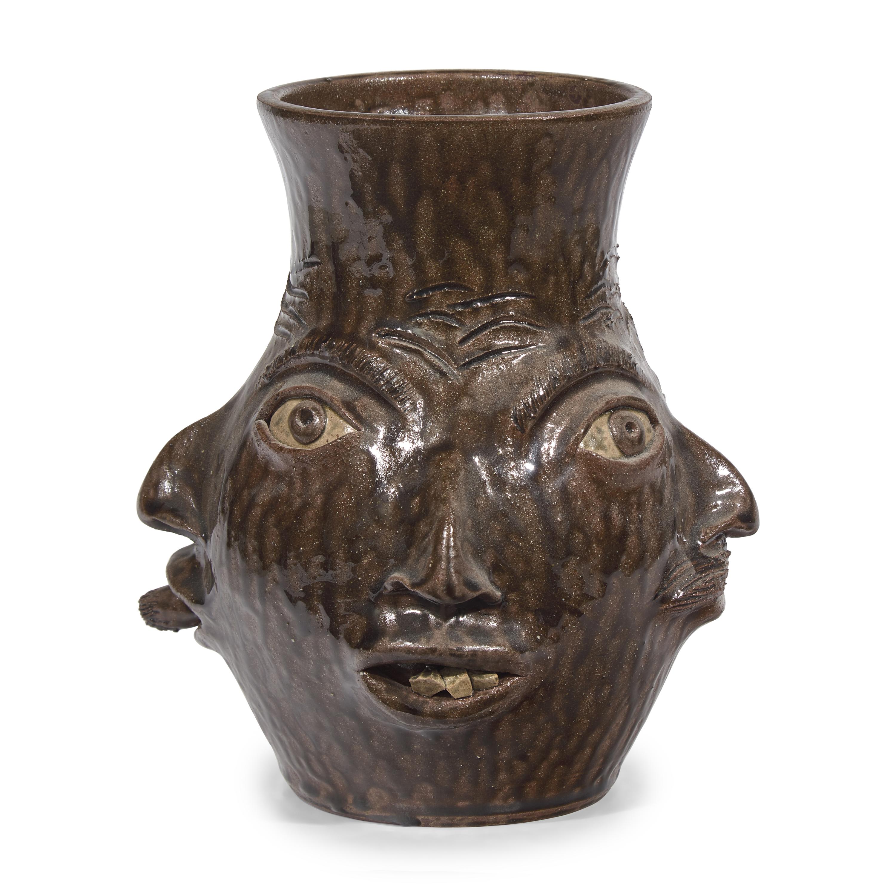 Charlie West, A Glazed Stoneware Work: Four-Sided Face Jug