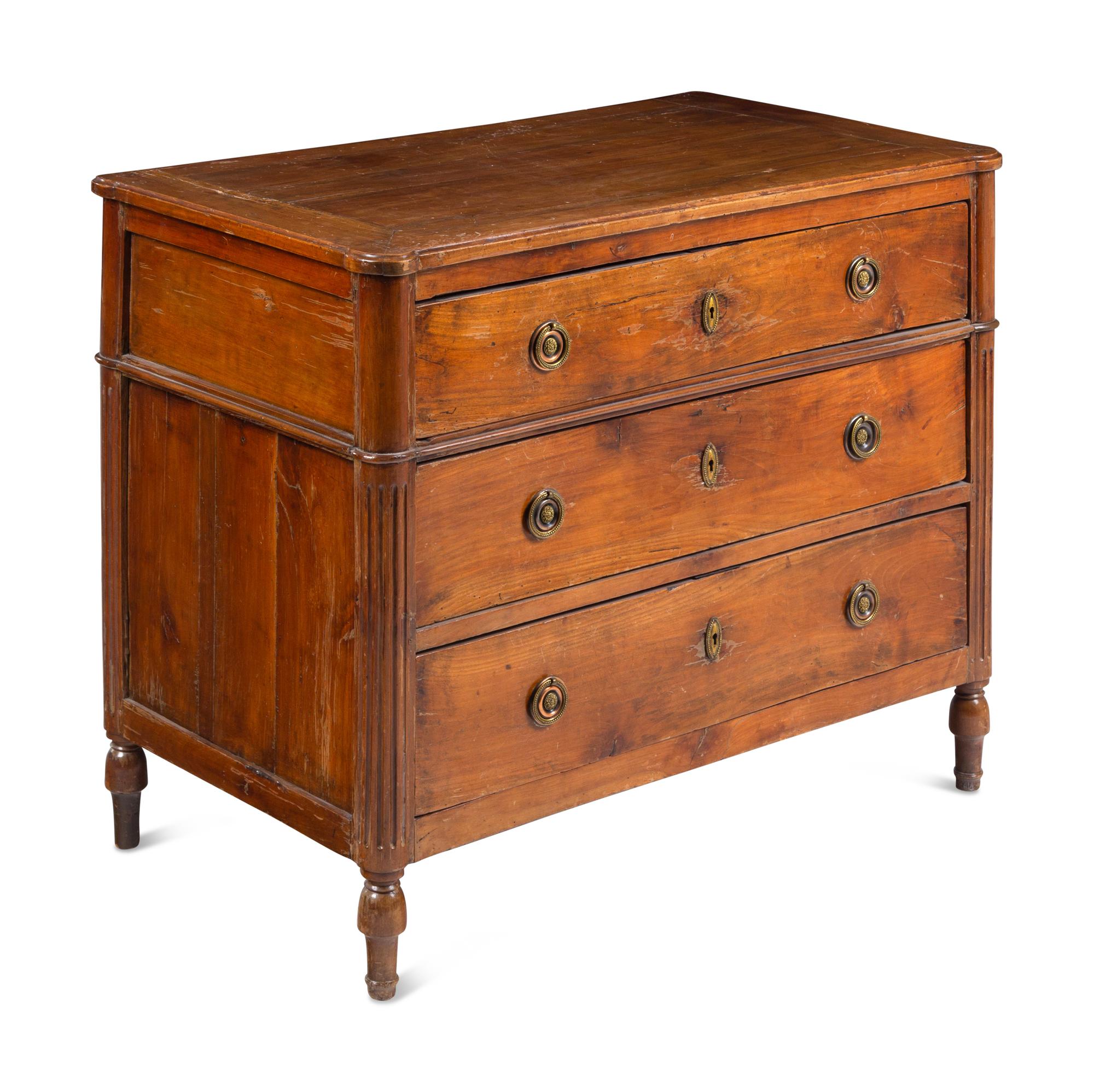 A Louis XVI Style Walnut Commode